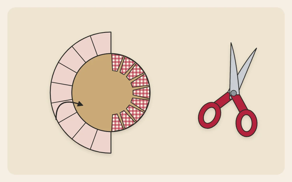 A card circle on the back of a fabric scrap with the edge snipped into tabs and folded over