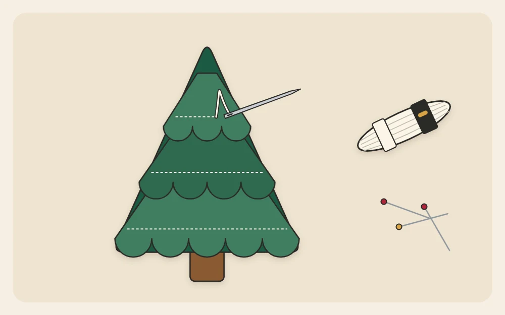 The tree front with two scalloped tiers stitched on and a threaded needle working along the third