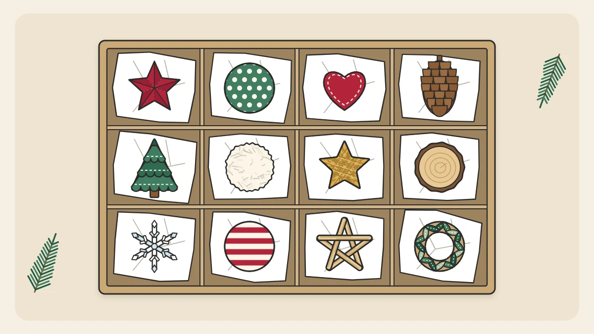 An open storage box with cardboard dividers, each compartment holding one handmade ornament wrapped in tissue paper