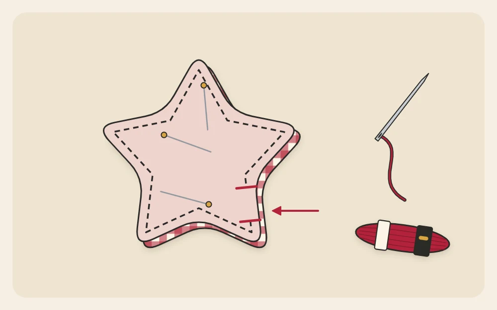 Two fabric stars pinned together with a dashed stitch line inside the edge and a gap marked on one side
